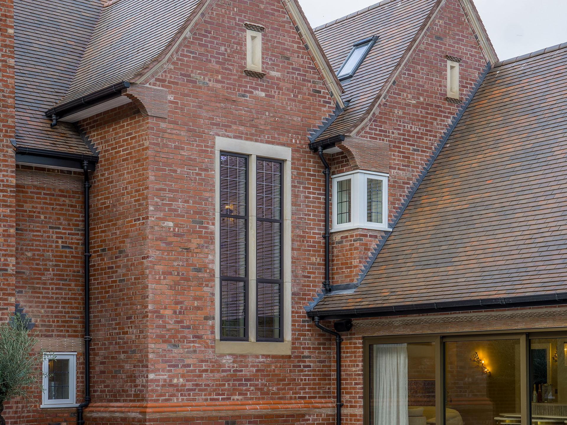 a luxury Mercia Homes new build with brown brindle roof tiles