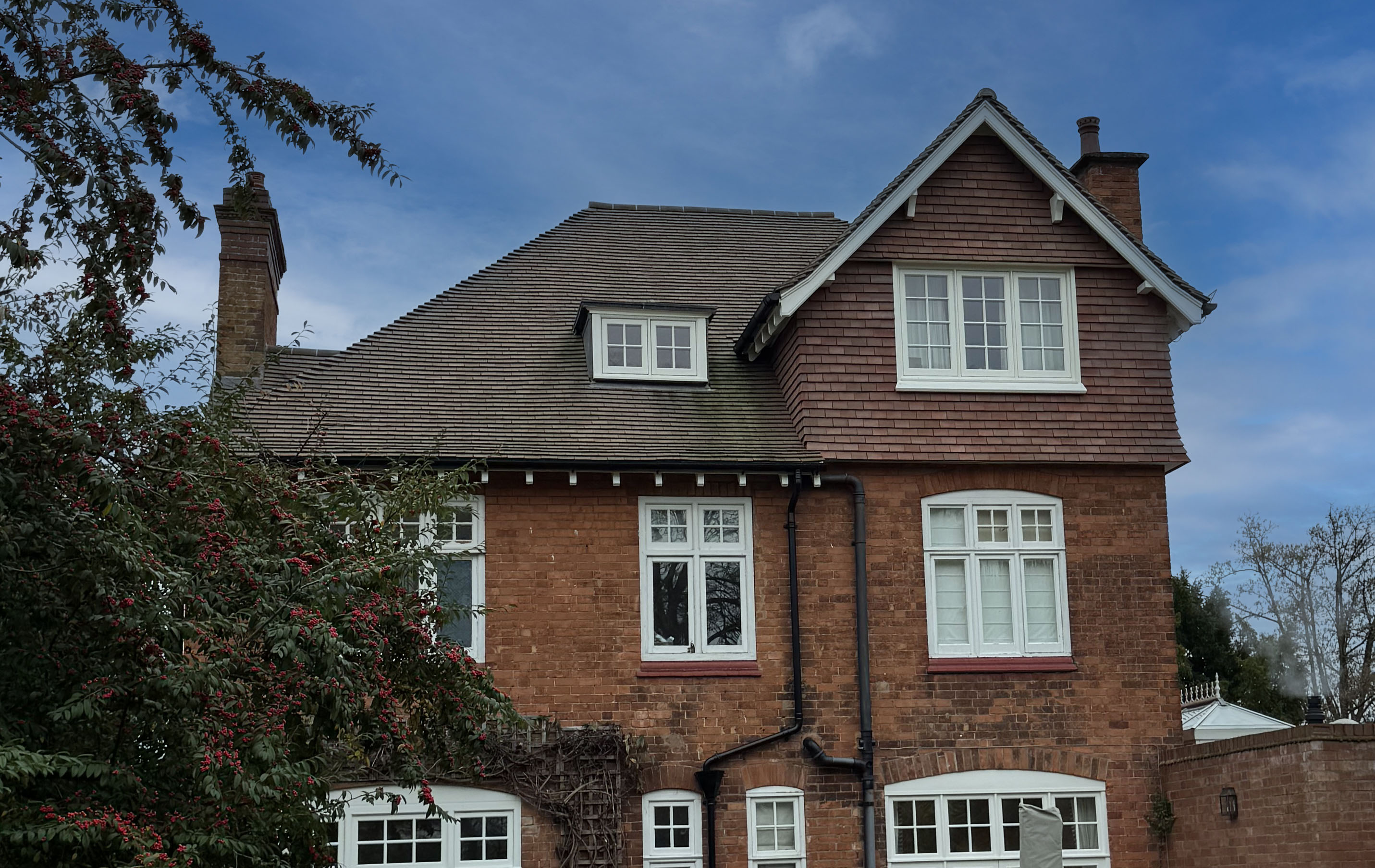 Brown Heather Handmade Roof and Bronze Handmade Vertical Tiling